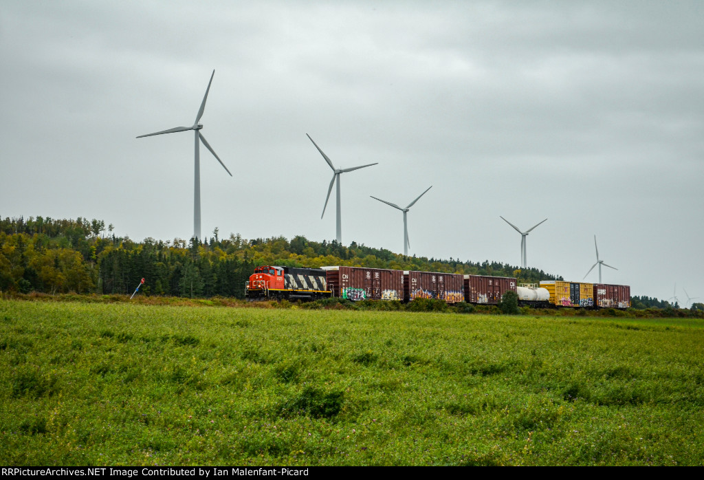 CN 9576 leads 561 at Route Du Cimetiere